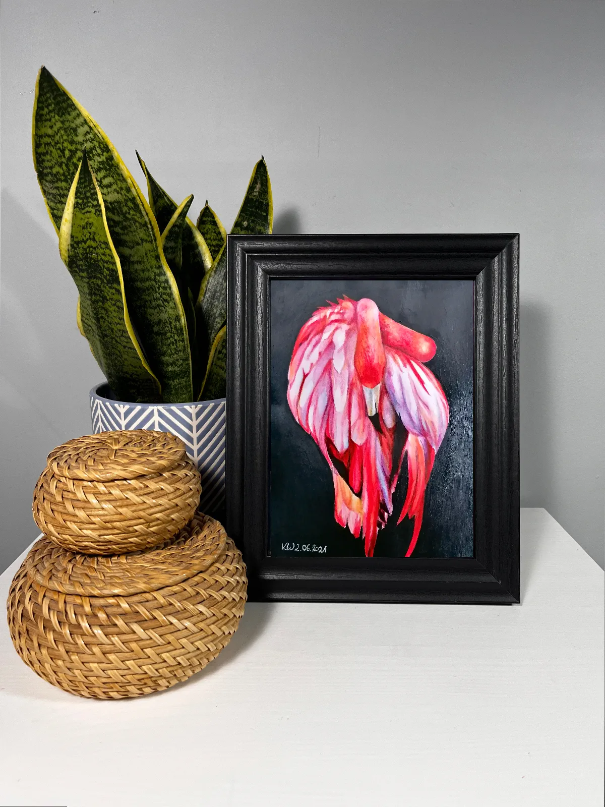 pink flamingo with folded feathers against dark background, expressive mixed media painting on paper
